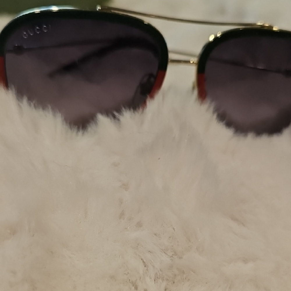 Gucci Black Sunglasses with Gold and Red Highlights